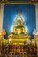 Golden Buddha statue in the Marble Temple or Wat Benchamabophit temple, Bangkok Thailand