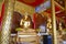 Golden buddha statue in monastery in thailand