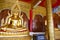 Golden buddha statue in monastery in thailand