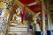 Golden buddha statue in monastery in thailand