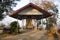 Golden buddha statue in pavilian on top of phu tok mountain