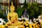 Golden buddha statue for pour watering on songkran day