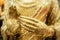 The golden Buddha statue.View of buddha statue in Thailand.Close up hand of statue Buddha.buddhism concept