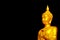 Golden Buddha statues black background