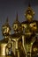 Golden Buddha statues inside Asian temple