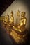 Golden Buddhist statues and carving showing intricate details and textures created by Buddhist monks around the world