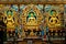 Golden Budha surrounded by colorful statues