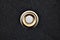 Golden Button On Black Textile