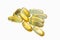 Golden capsules of Omega 3 on white background