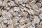 Golden cereal muesli, background and texture. Oatmeal grains closeup, top view, macro. Healthy breakfast