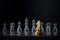 Golden chess knight is facing the silver opponent chess on black background. Leader, leadership, business strategy, challenge,
