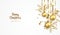 Golden Christmas balls background. Festive golden glitter Christmas decoration and bright snowflake hanging on a ribbon.