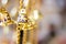 Golden christmas bells hanging as new year toys defocused background