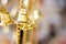 Golden christmas bells hanging as new year toys defocused background