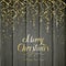Golden Christmas tinsel on black wooden background