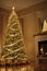 Golden Christmas tree with bright lights wallpaper banner xmas Ai Generated