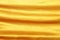 Golden color of wrinkle fabric cloth for background texture and design