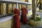 Golden coloured Buddhist prayer wheel at Namgyal Monastery, Dharamsala, Himachal Pradesh,