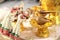 A golden conch set and flower garlands for Thai water pouring wedding c