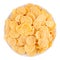 Golden corn flakes in white bowl isolated, top view. Cereals.