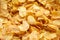 Golden cornflakes breakfast texture background