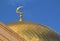 Golden crescent on the top of the Central Mosque of Moscow city,
