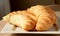 Golden Croissants On Plate.