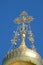 Golden cross against blue sky on russian chapel at Mathildenhoehe, Darmstadt