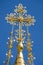 Golden cross against blue sky on russian chapel at Mathildenhoehe, Darmstadt