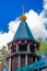 Golden cross on the dome against the blue sky. Temple of St. Seraphim of Sarov in the monastery in honor of the holy royal passion