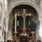 golden cross inside St. Bartholomews church in London