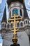 Golden cross symbol at church tower ornamental decoration