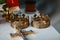 Golden crowns and wedding rings at the altar in the church at the wedding couple. traditional religious wedding ceremony