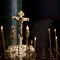 Golden crucifix with candles