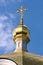 Golden crucifix and Cupola of Orthodox church