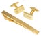 Golden cuff link and tie pin