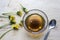 Golden dandelion jam in a glass bowl