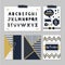 Golden and dark navy blue alphabets and design elements set