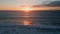 Golden dawn sky serene ocean surf. Aerial view sunset sea rippling water surface