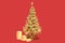 Golden decorated Christmas tree with gift boxes. 3D Rendering