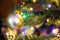 Golden decoration globe on christmas tree close up