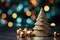 Golden decorative Christmas tree with toys balls on a dark background with highlights