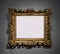 Golden decorative frame for painting on wall