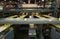 Golden Delicious Apples on conveyor belts in a packing warehouse