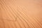 Golden  desert sand texture as background.