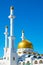 Golden dome and tall minarets of Abu Nasr Al-Farabi mosque