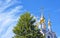 Golden domes of the Orthodox Church, white clouds