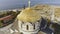 Golden domes of the Orthodox Vladimir Cathedral in Chersonesos, on the background of blue sea. Shot. The largest temple