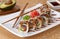 Golden dragon sushi roll with tuna, eel, cucumber