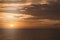 Golden dramatic sunset over the Mediterranean sea, beautiful natural background, tranquility and harmony in nature, the concept of